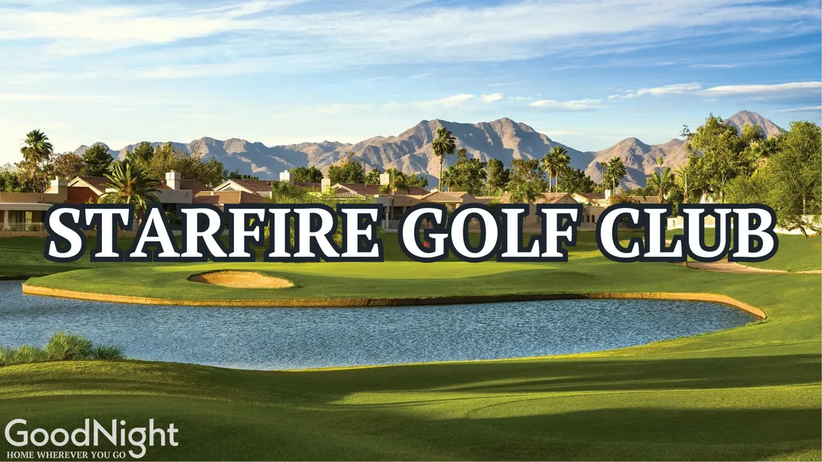 A scenic view of a lush golf course featuring a sparkling lake, palm trees, and mountains in the background. The inviting clubhouse sits at the edge of the water, while golfers can be seen enjoying the surroundings.